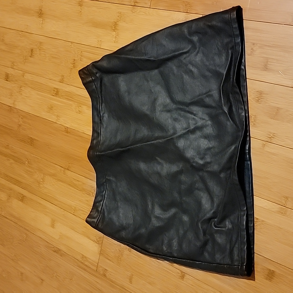 Black leather mini skirt
